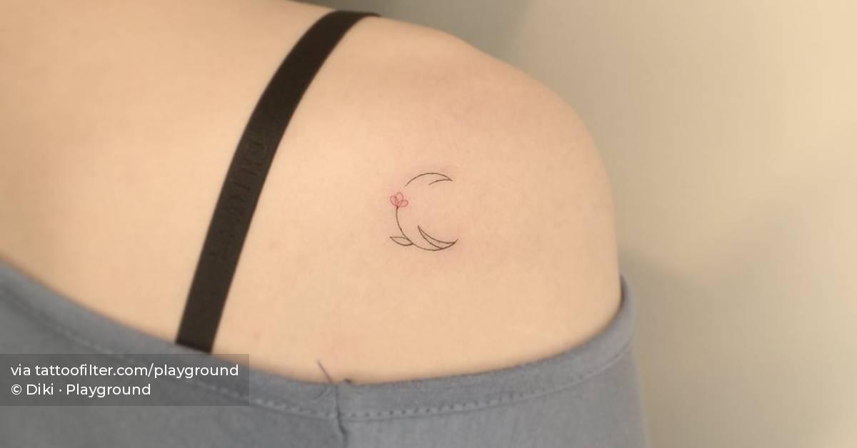 Fine line flower moon tattoo done on the shoulder