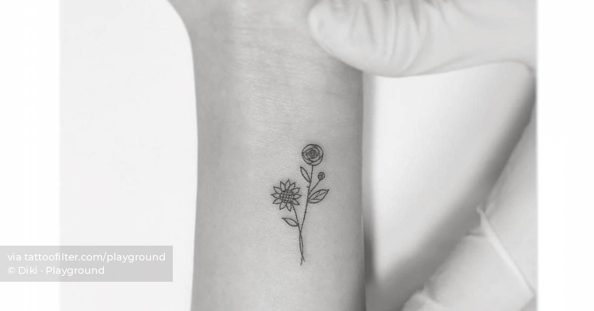 Minimalistic style sunflower and rose tattoo located on