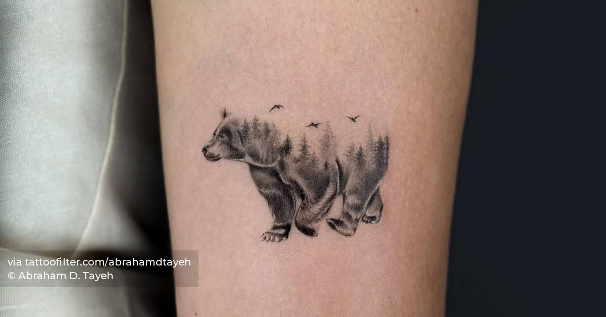 Micro-realistic style bear tattoo located on the