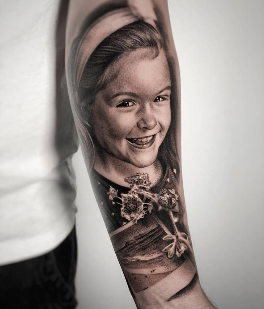 Child Portrait Tattoo Located On The Inner Forearm 