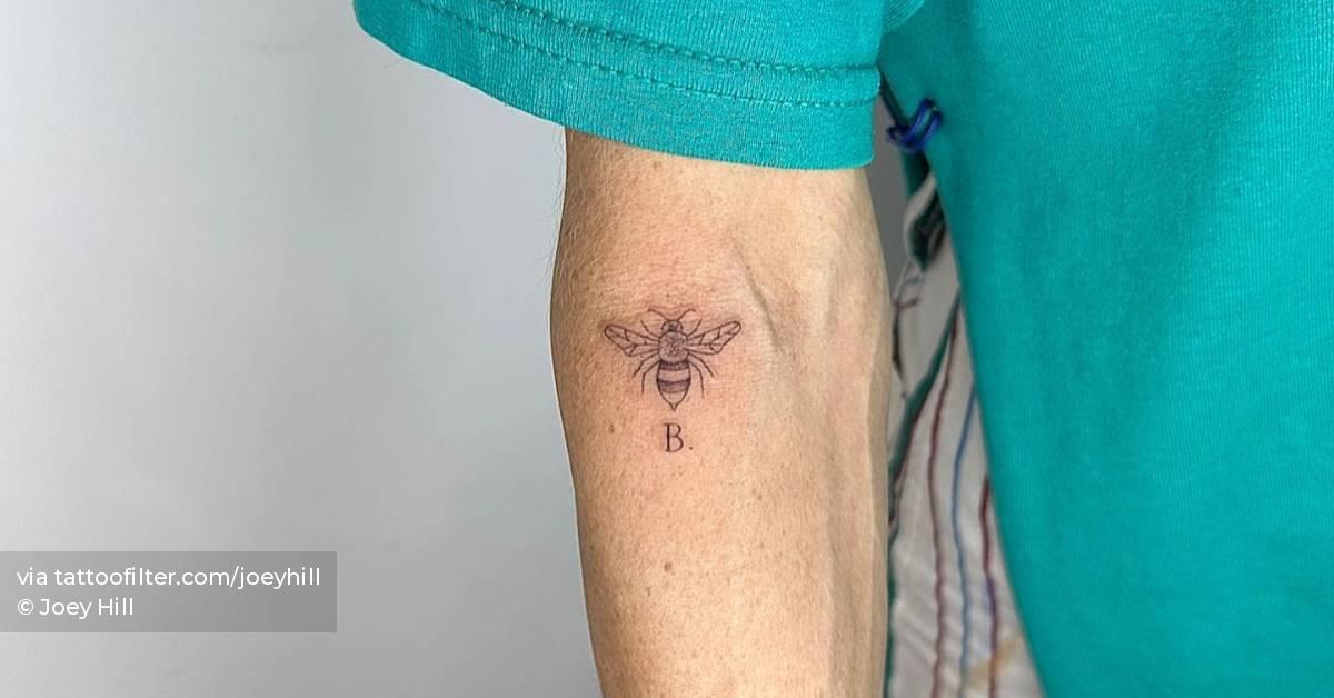 Single Needle Bee And Letter B Tattoo Located On The single-needle-bee-and-letter-b-tattoo-located-on-the