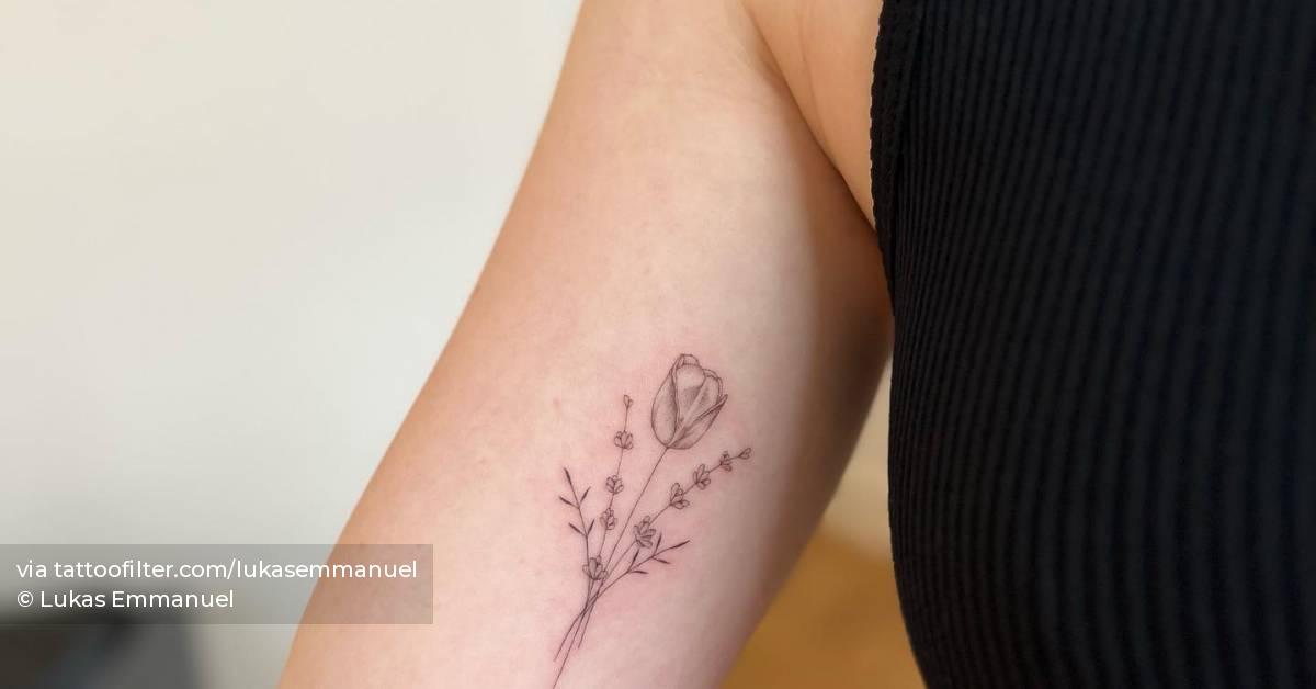 FIne line flower bouquet tattoo located on the inner
