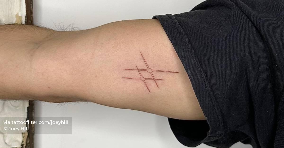 Fine line style tattoo located on the inner arm.