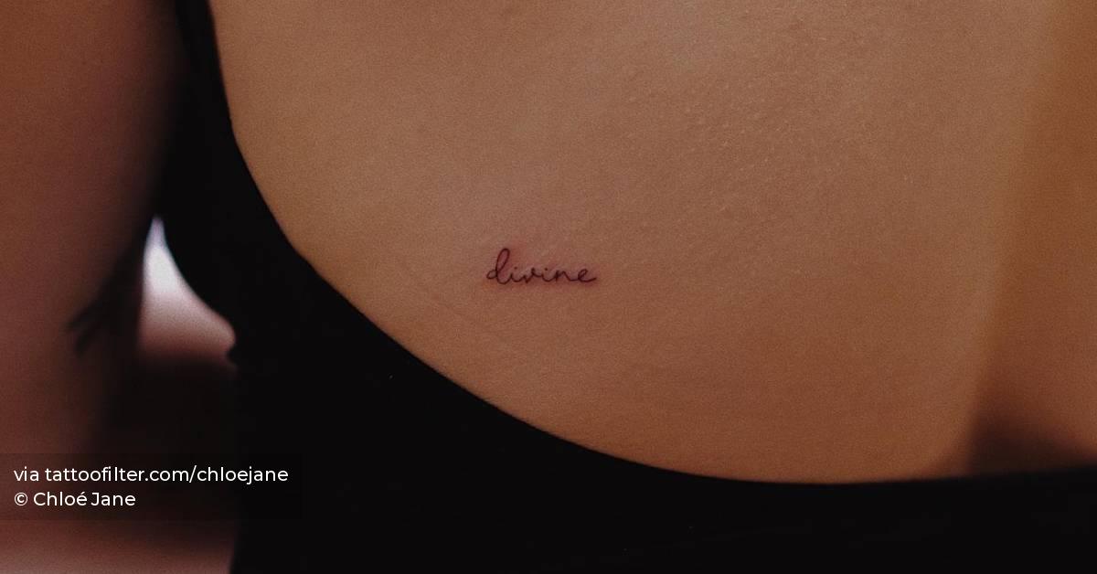 tattoo-of-the-word-divine-located-on-the-back