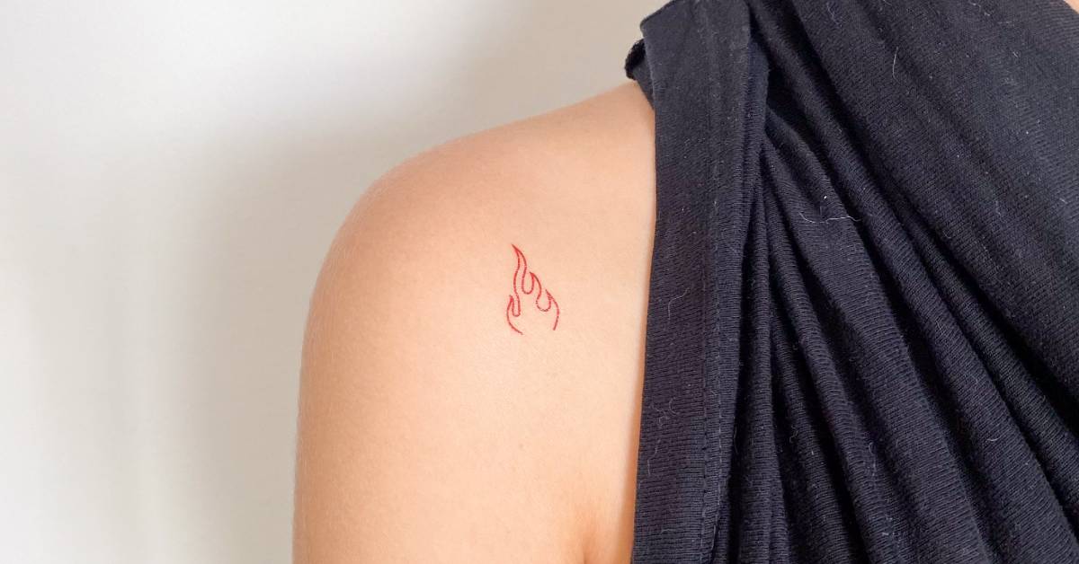 Red fire flame temporary tattoo located on the
