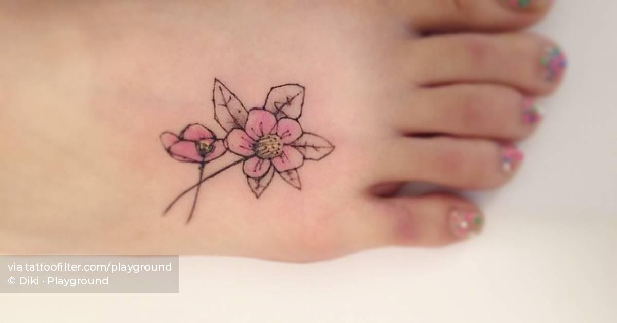 Hellebores tattoo located on the foot, illustrative