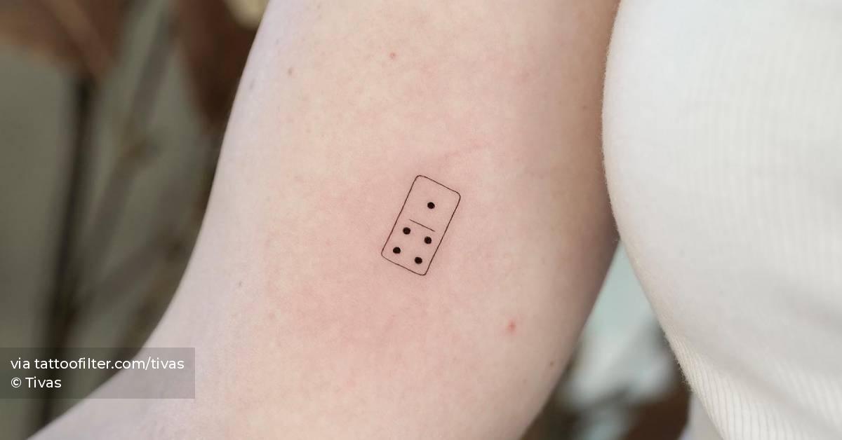 Cute little domino piece tattoo