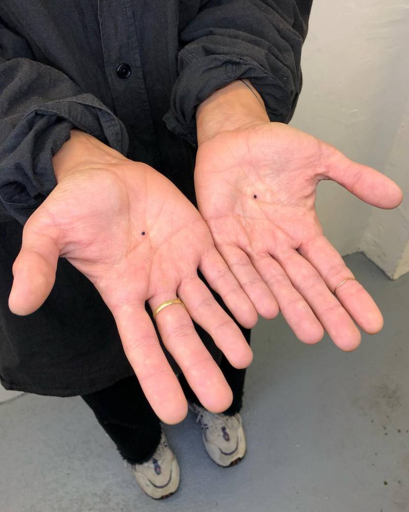 Individual Matching Dots Tattooed On The Palm 