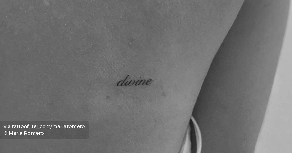 tattoo-of-the-word-divine-located-on-the-back