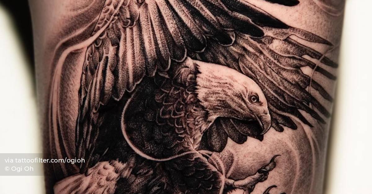 Black and grey eagle tattoo placed on the inner arm.