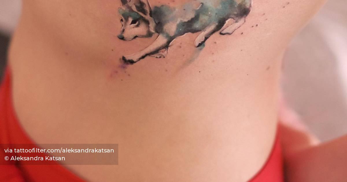 Wolf On Ribs Watercolor style wolf tattoo located on the rib.