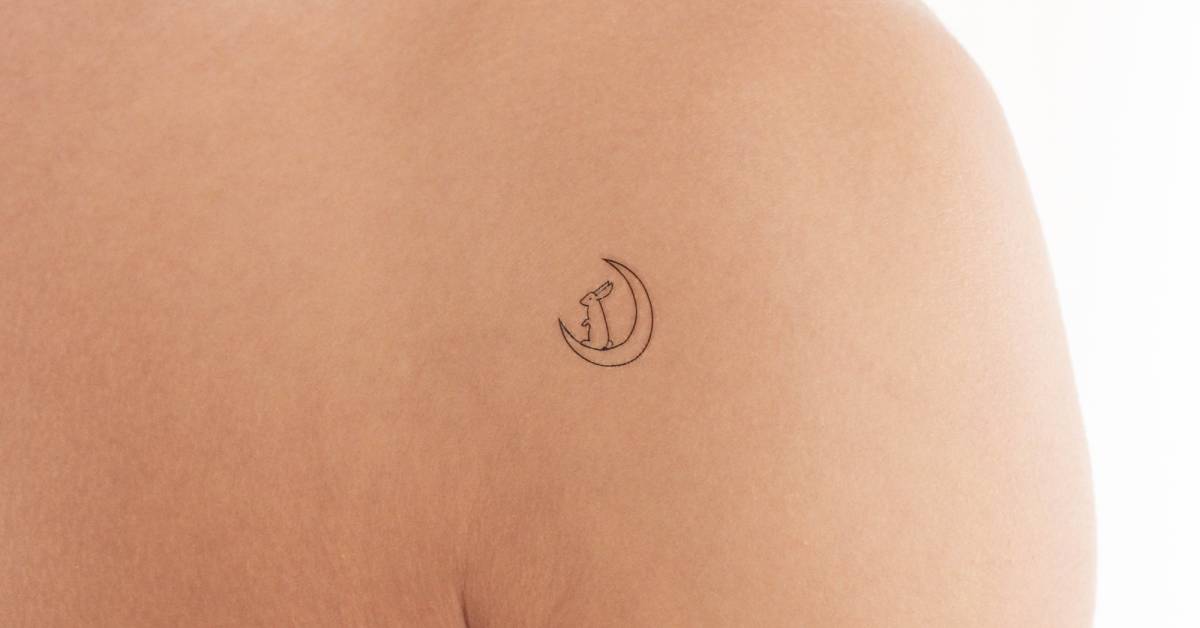 Moon and rabbit temporary tattoo located on the