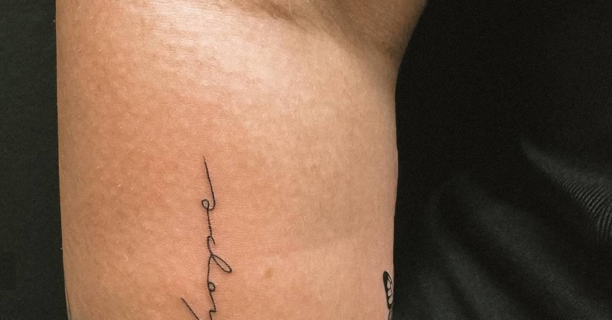 Tattoo of the word "hope" located on the forearm.