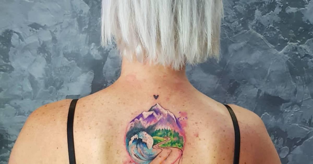 Watercolor Style Mountain And Wave Tattoo Located On watercolor-style-mountain-and-wave-tattoo-located-on
