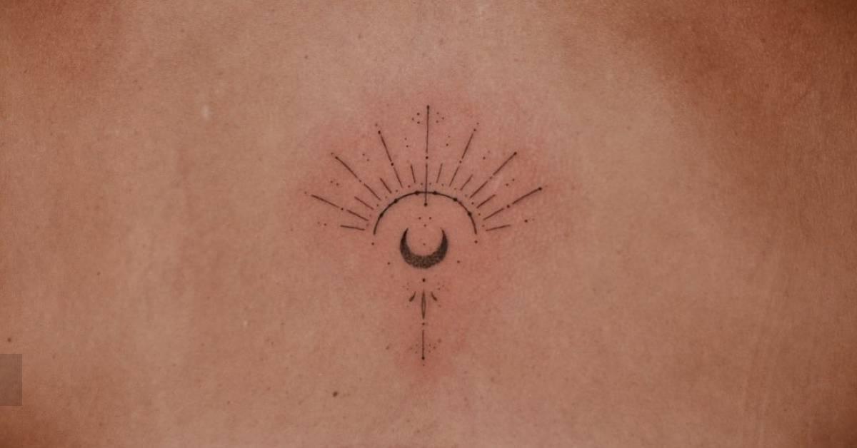 Fine line style ornamental moon tattoo done on the