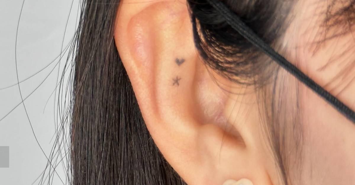 Healed minimalistic style heart and star tattoo done on