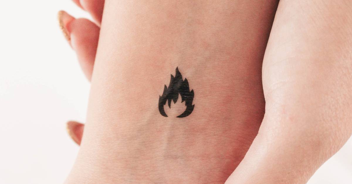 Minimalist Fireball Tattoo Black: Bold Simplicity in Ink