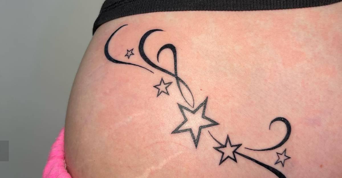 Stars tattoo located on the waist, illustrative style.