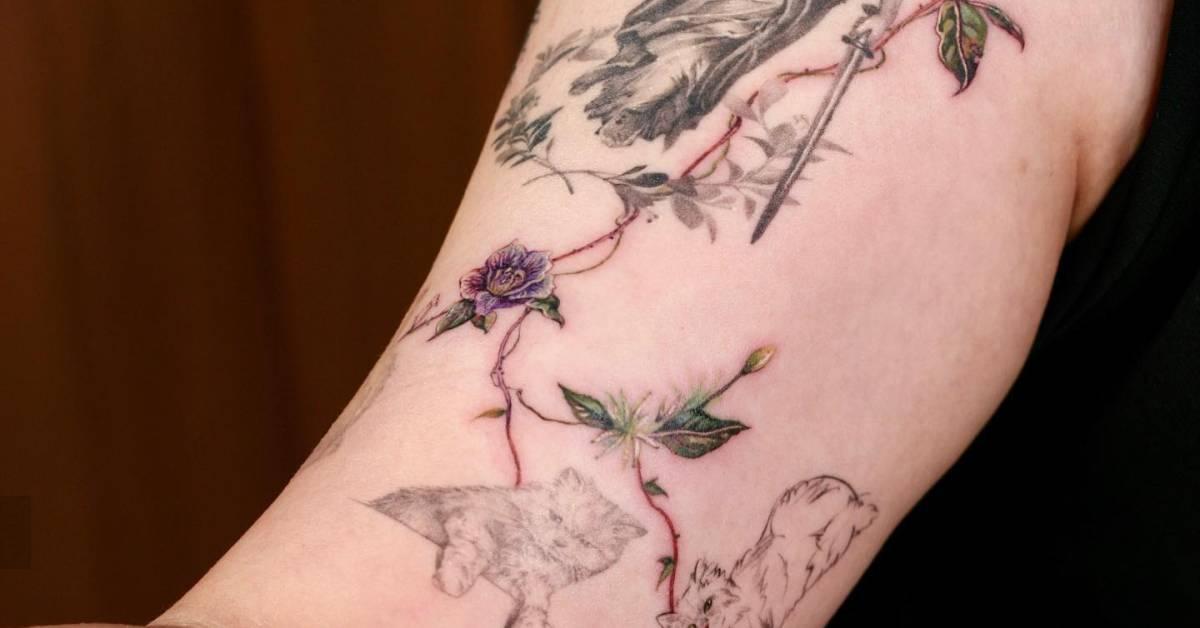 Freehand floral gap filler tattoo located on the arm.