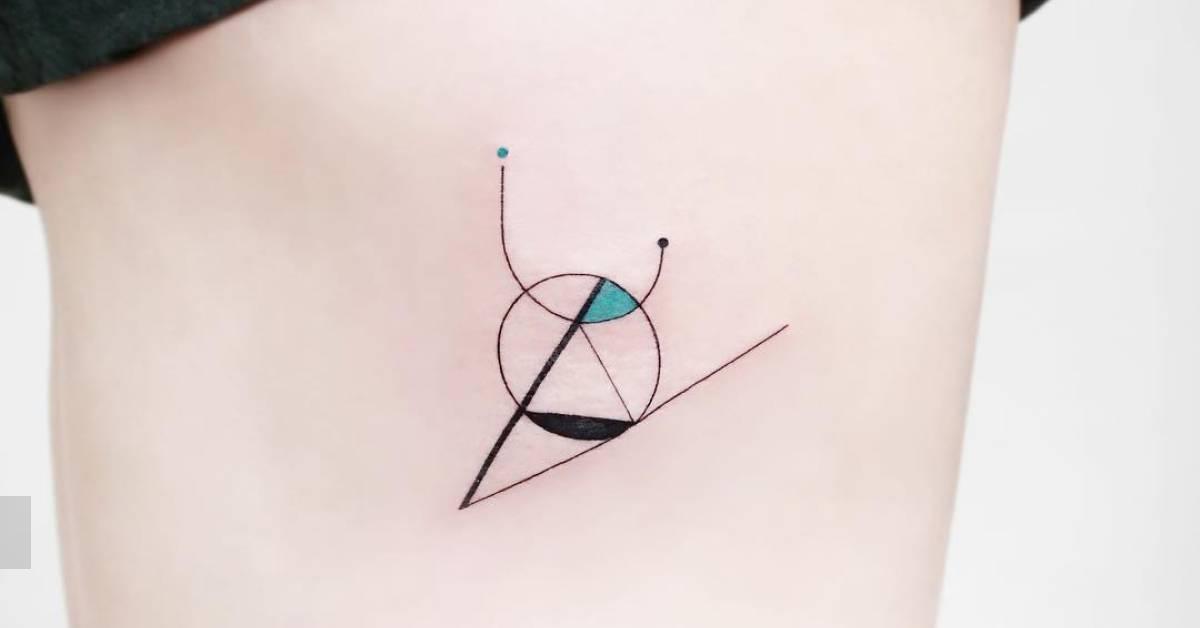 Abstract geometric tattoo located on the rib.