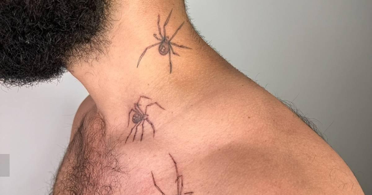 Spiders tattooed on the collarbone and neck.