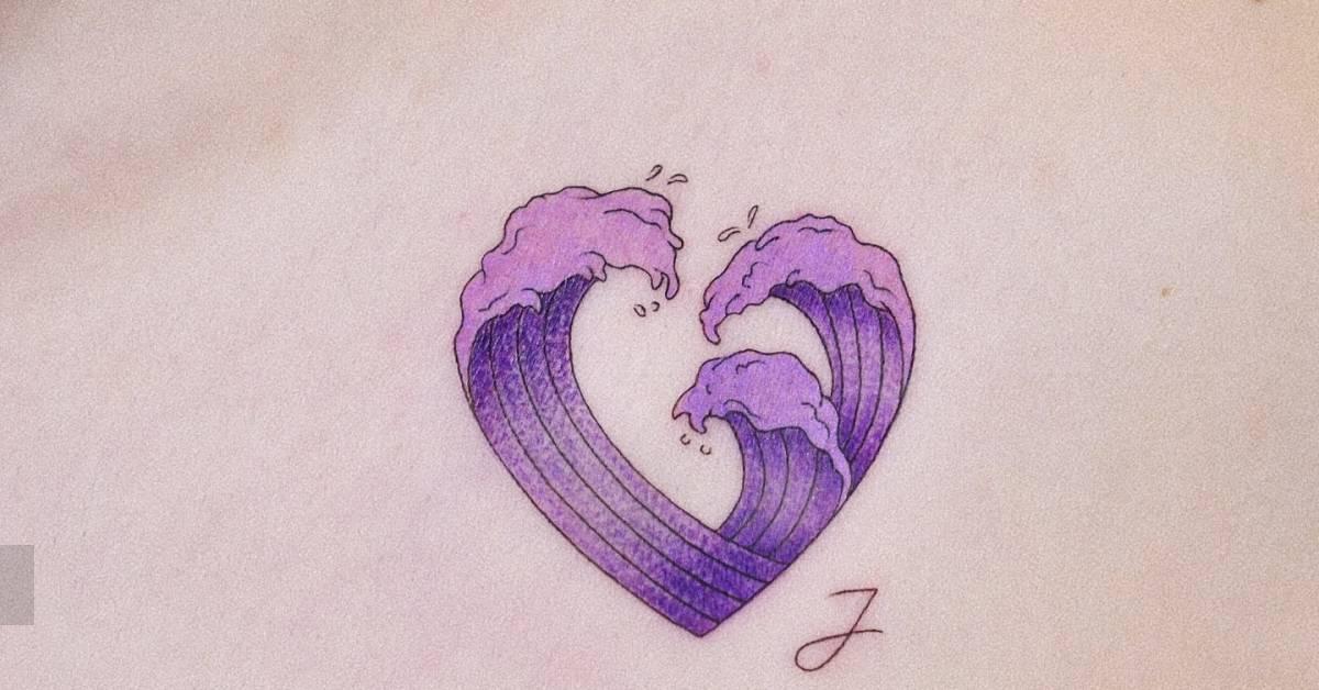 Illustrative style wave heart tattoo located on the