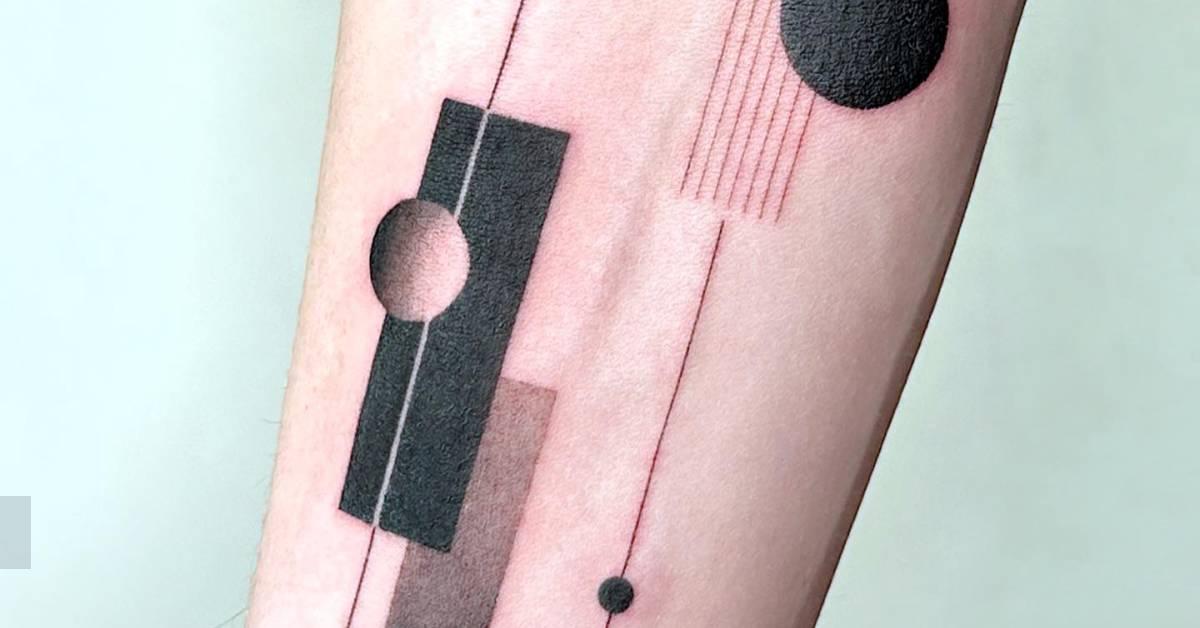 Abstract geometric tattoo located on the inner forearm.