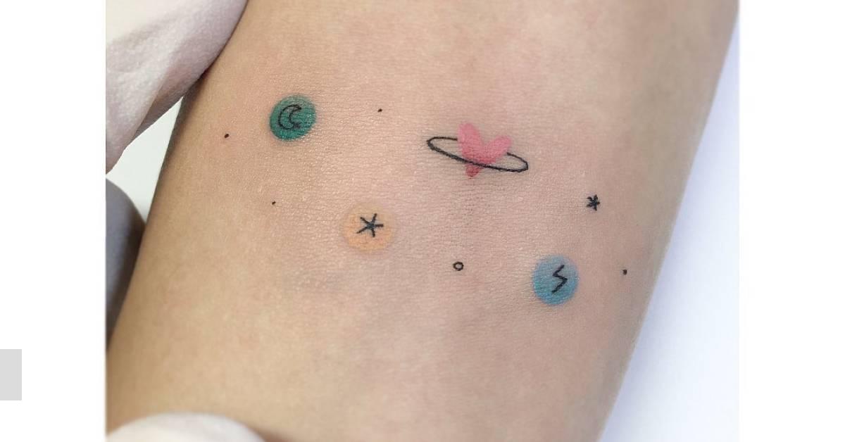 Galaxy tattoo located on the inner forearm,