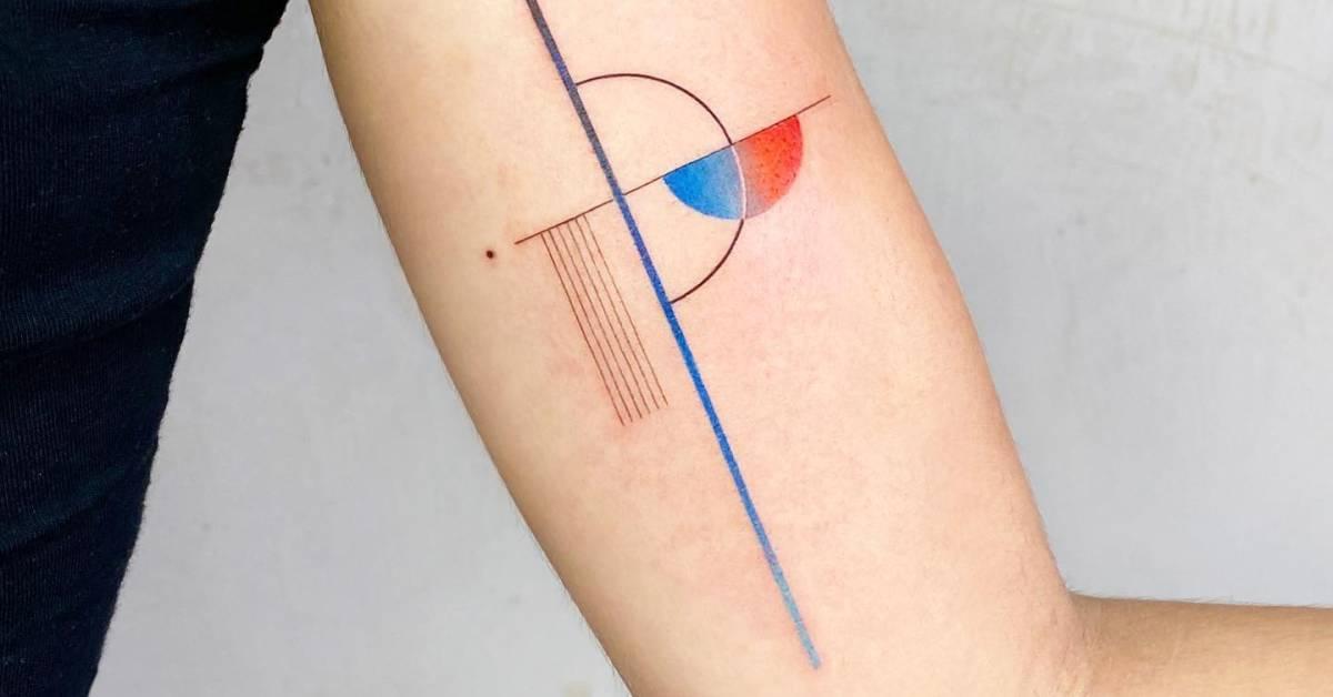 Abstract geometric tattoo done on the inner arm.