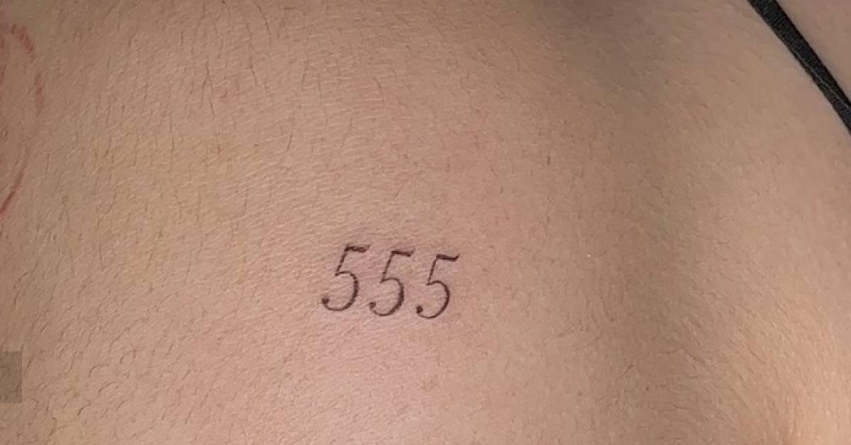 Angel number "555" tattoo placed on the shoulder.