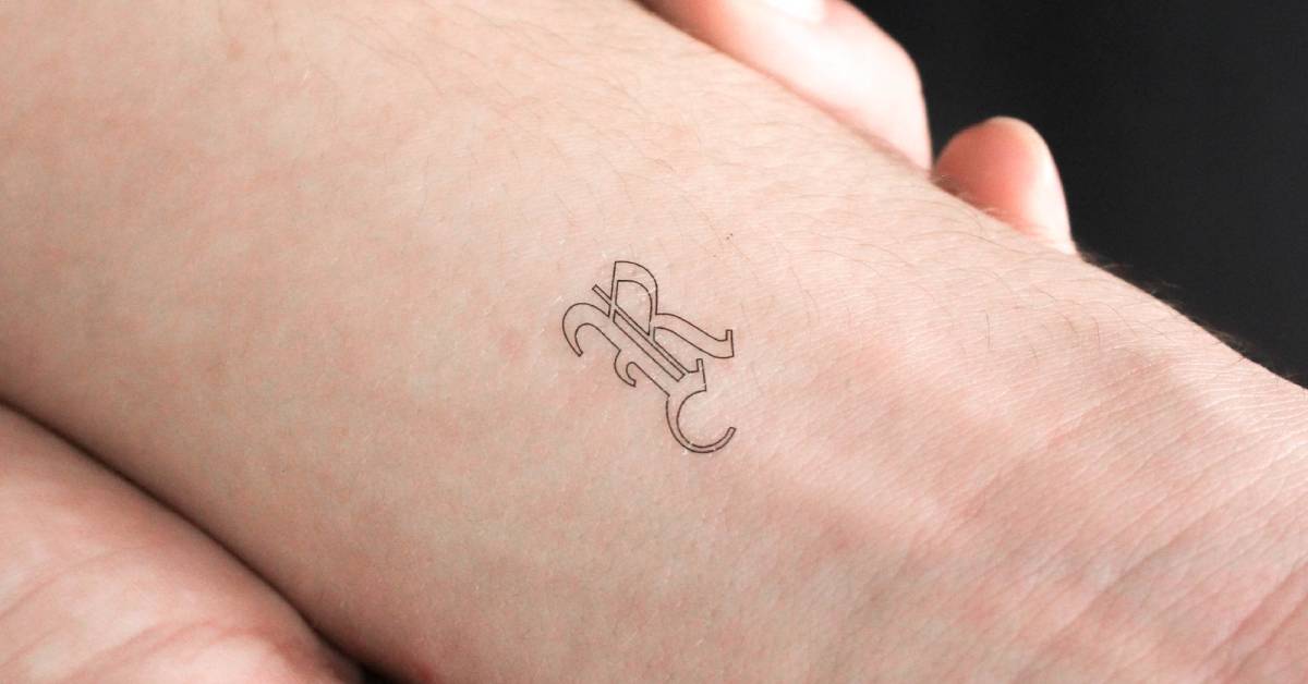 Old English style R letter outline temporary tattoo