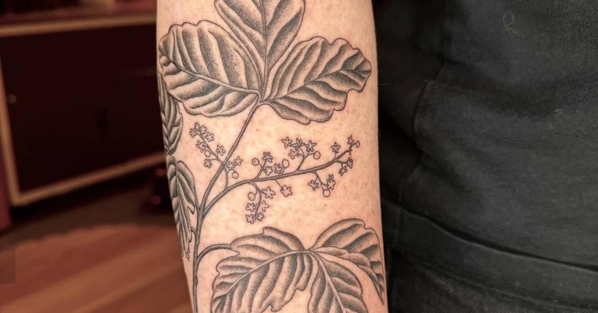 Poison oak tattoo in illustrative style located on the