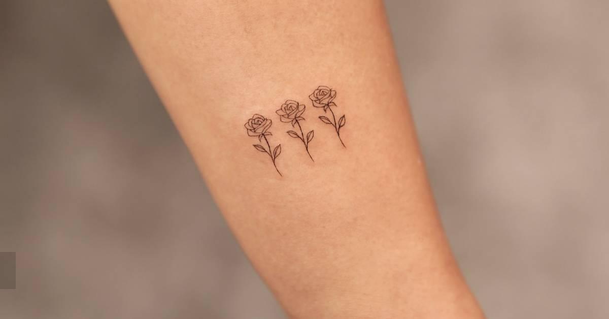 Roses tattoo in fine line style located on the wrist.
