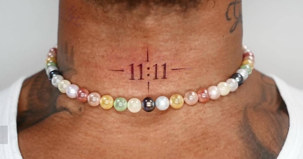 11:11" angel number tattooed on Lewis Hamilton's