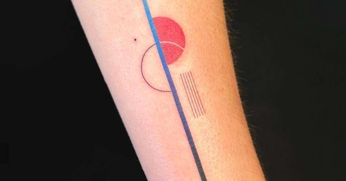 Abstract geometric tattoo placed on the inner forearm.