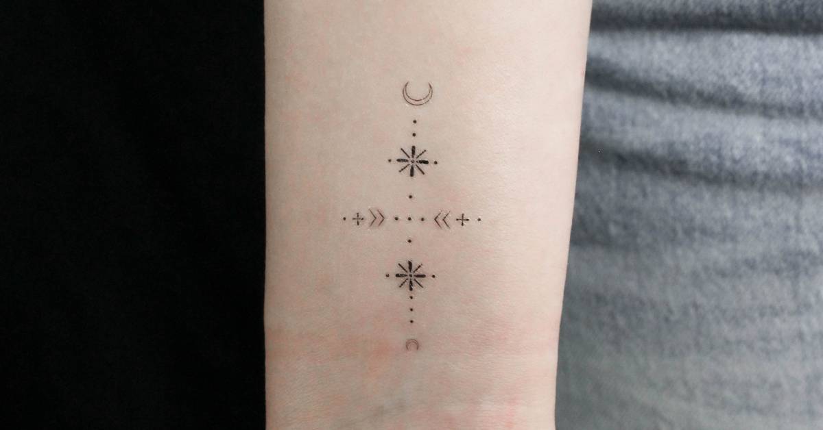 Small wrist ornament temporary tattoo located on the