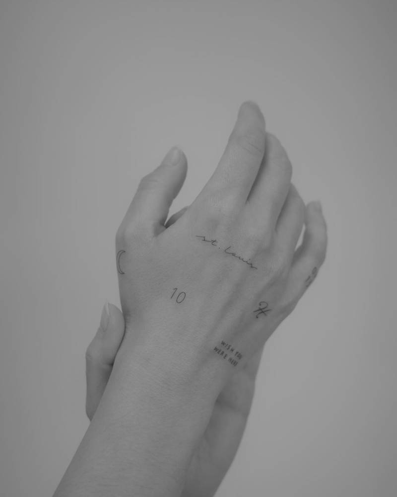 Fine line style hand composition tattoos.