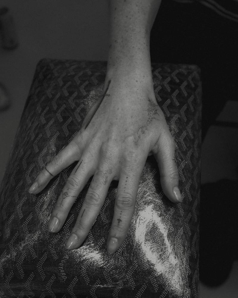 Ellie Goulding's hand composition tattoos.