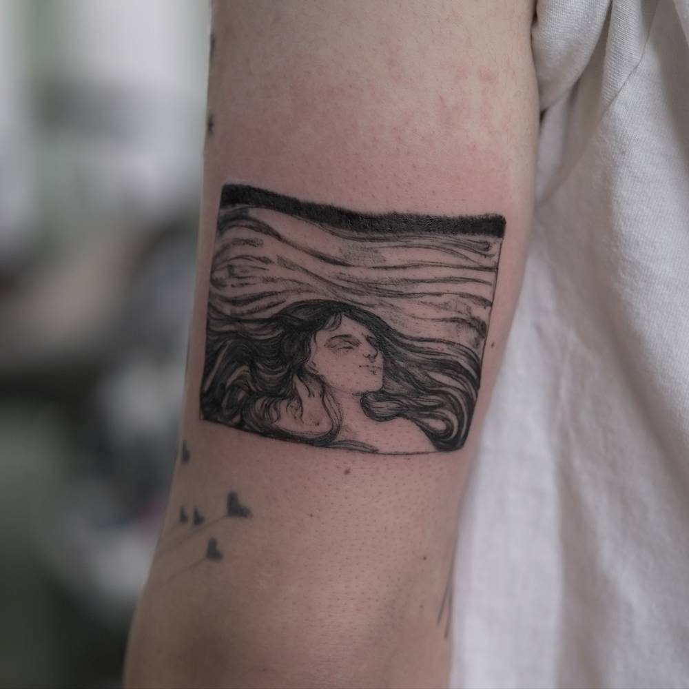 "On the Waves of Love" by Munch tattooed on the tricep.