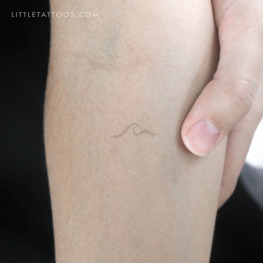 Small minimalistic wave by 1991.ink temporary tattoo.