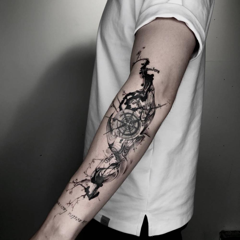 Blackwork style branches around old tattoo.