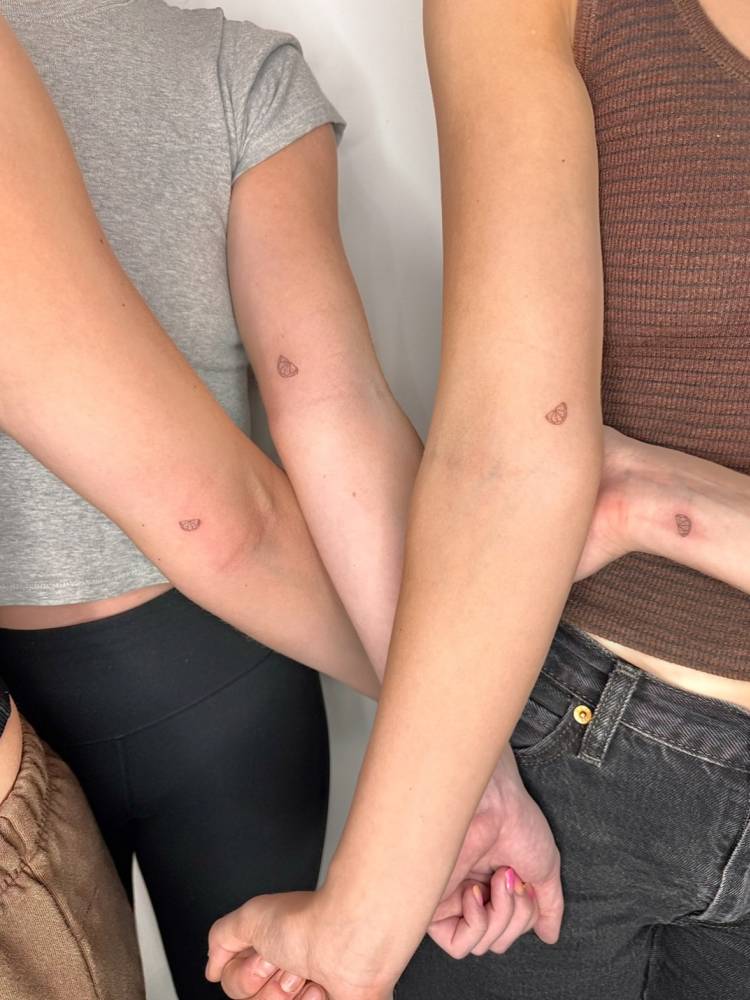 Matching little lime slices tattoo for best friends.