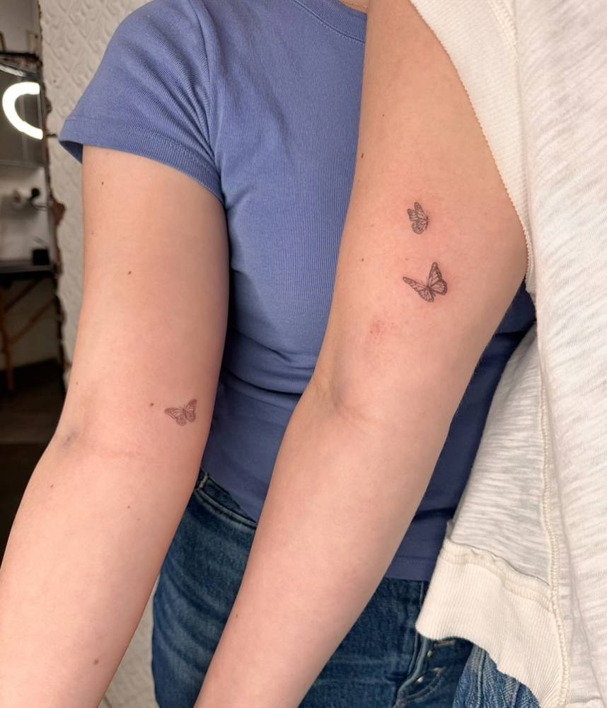 Matching butterflies tattoo for best friends.