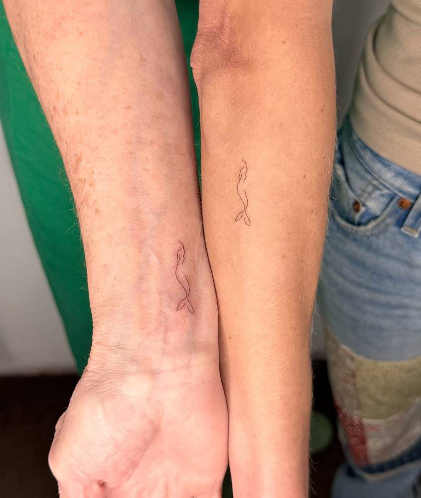 Matching minimalistic mermaid tattoo for best friends.