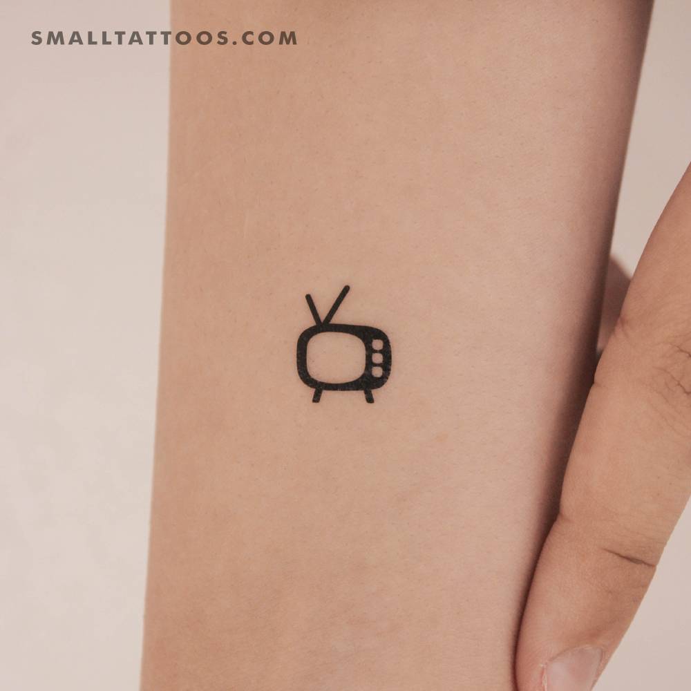 Tiny minimalistic TV temporary tattoo done on the wrist.