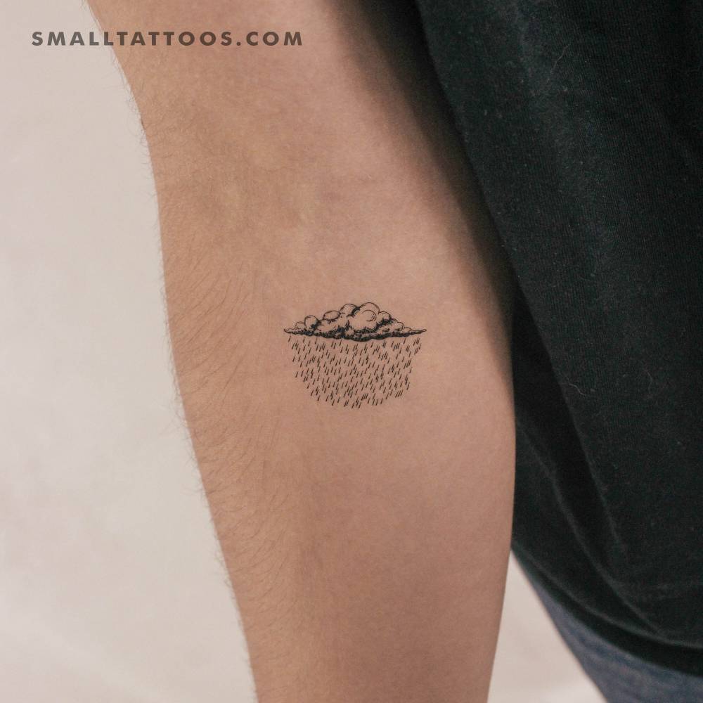 Blackwork style rain temporary tattoo located on the inner forearm.
