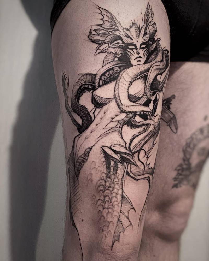 Sea goddess Thassa from Magic The Gathering tattooed on the thigh.