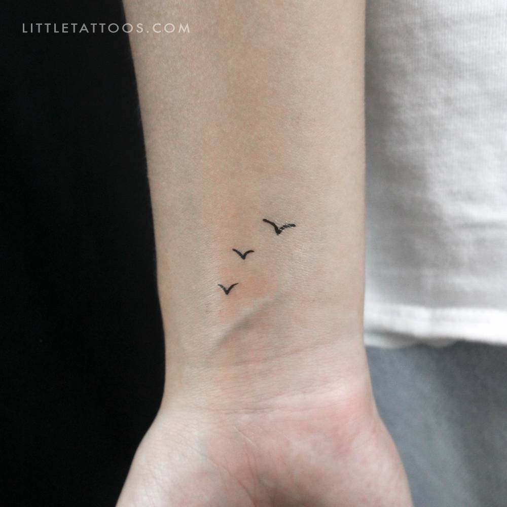 Minimalistic style three little birds temporary tattoo.
