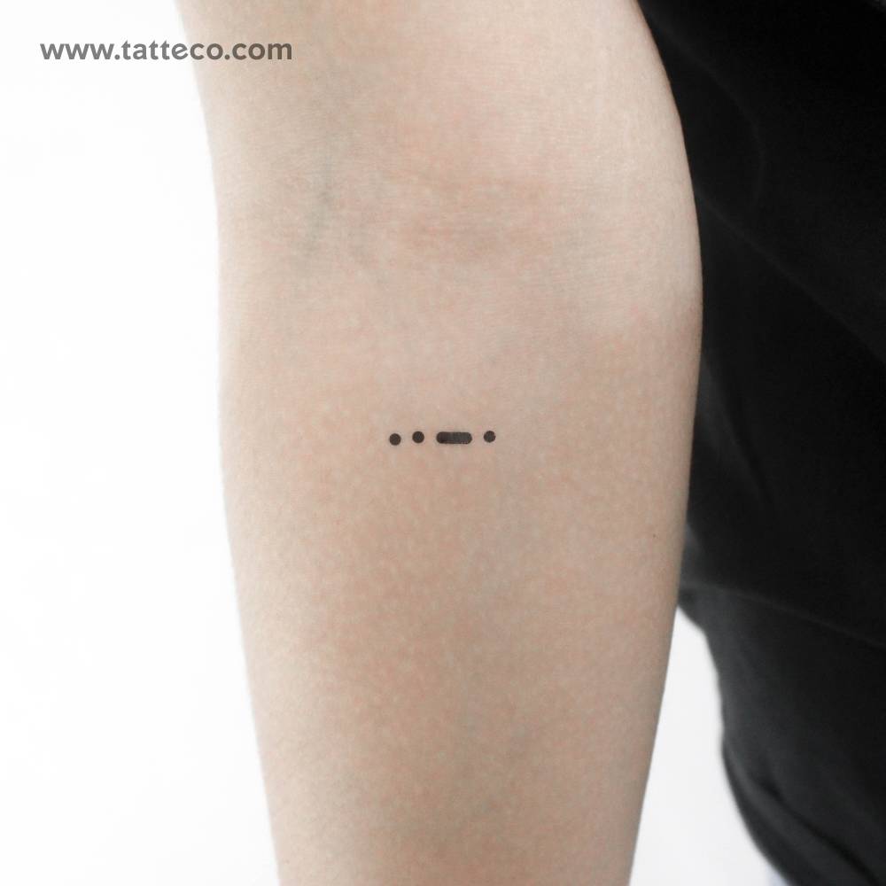 Morse Code F temporary tattoo located on the inner forearm.
