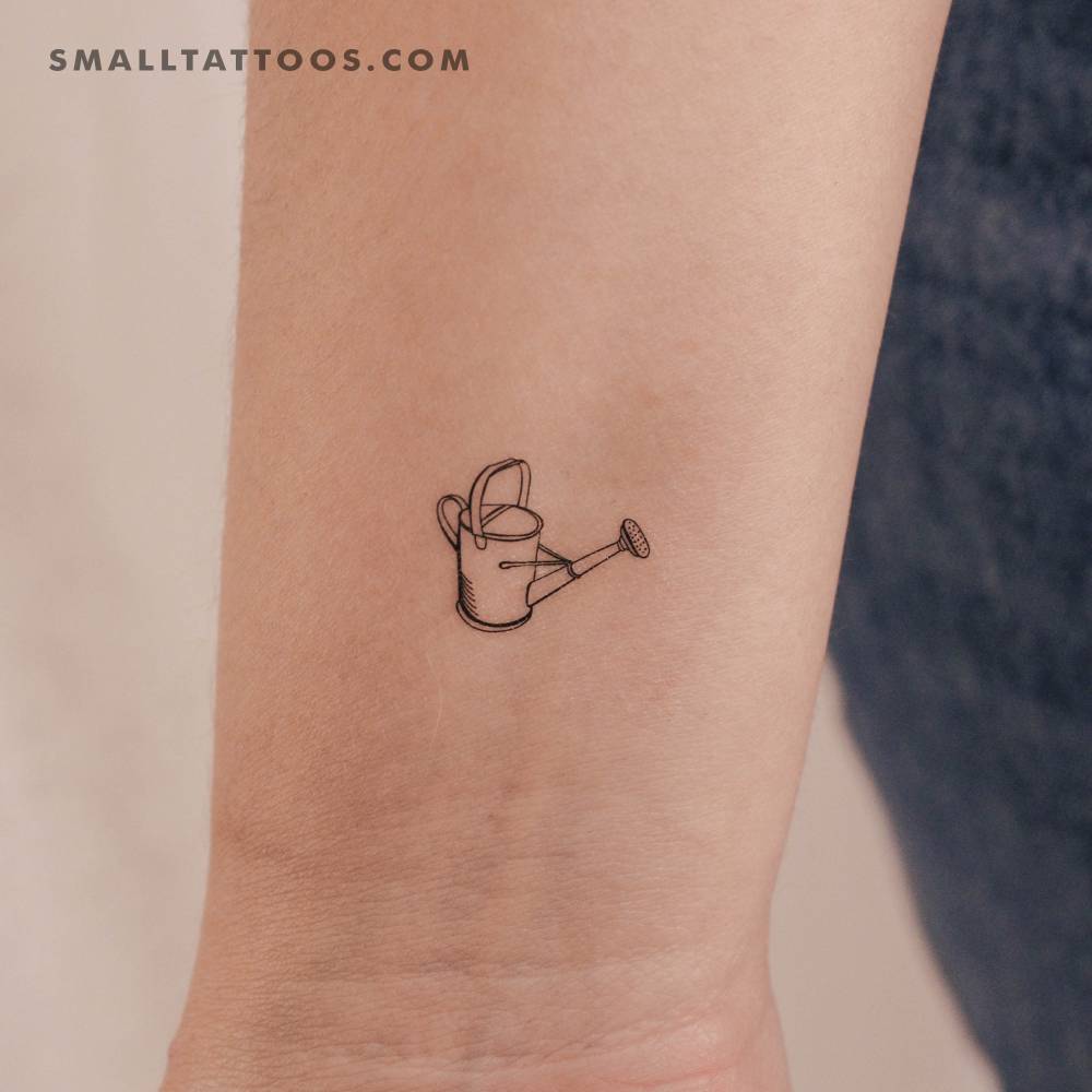 Watering can temporary tattoo in fine line style located on the wrist.